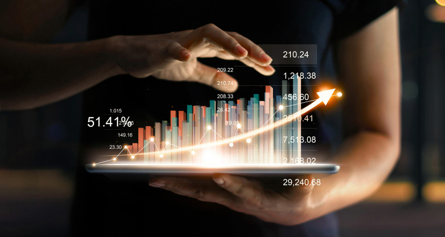 businessman holding tablet showing growing virtual hologram statistics 